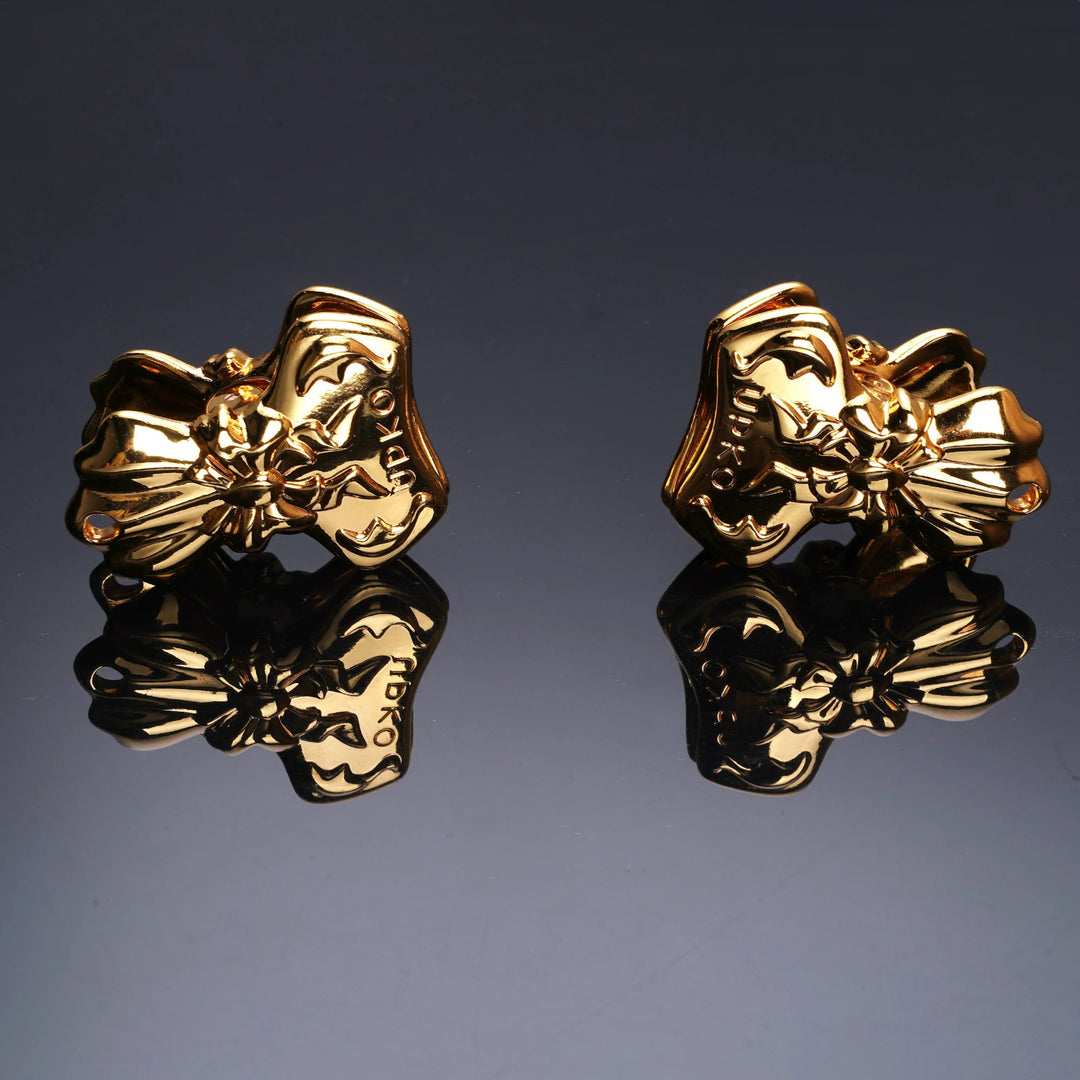 UPKO - MORSETTI PER CAPEZZOLI CON NODO A FIOCCO